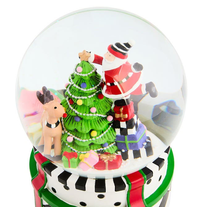 Candy Cottage Nutcracker Snow Globe