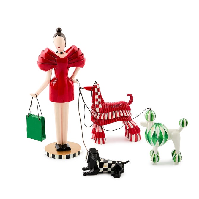 Check It Out Shopper Lady with Dogs Figurine